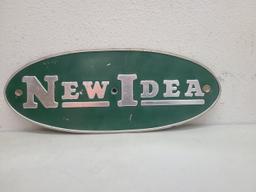 SST Embossed, New Idea Oval Tin Sign