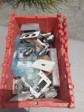 Plastic bin of electrical outlets and more