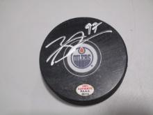 Connor McDavid of the Edmonton Oilers signed autographed logo hockey puck PAAS COA 115
