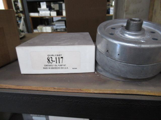 CONTENTS OF SHELF - ASSORTED PISTON RINGS, CYLINDER SLEEVE MATERIAL, & OIL PUMPS
