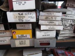 CONTENTS OF SHELF - ASSORTED PISTON RINGS & OIL PICKUPS