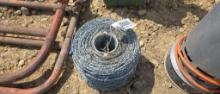 NEW ROLL OF BARB WIRE