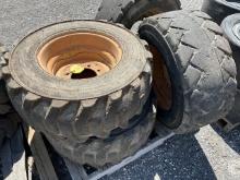 (4) Used Skid Steer Tires & Rims