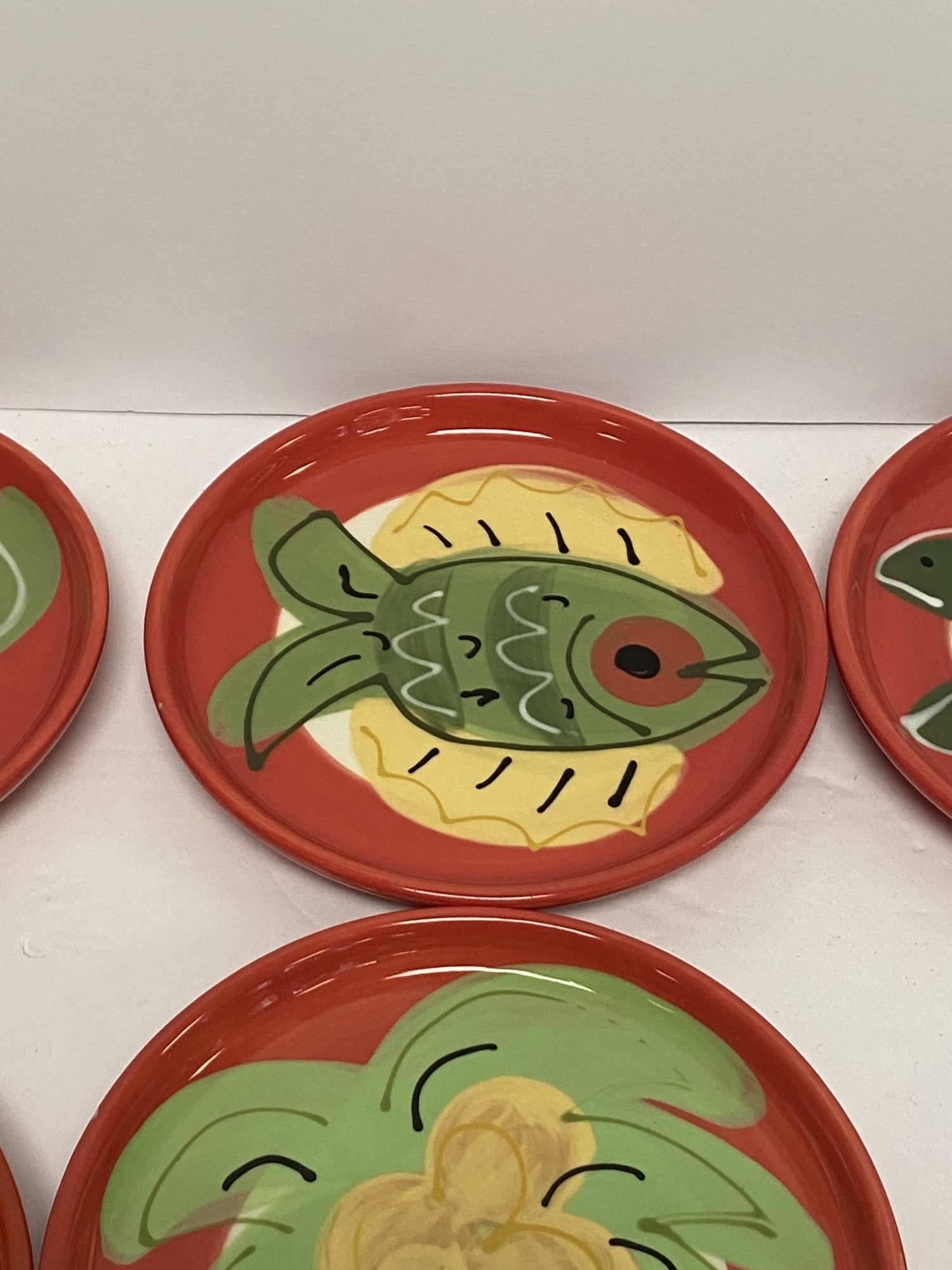 8 - 6" PLATES BY SUSAN PAINTER