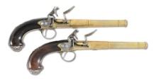 (A) FINE PAIR OF SILVER MOUNTED BRASS BARRELED QUEEN ANNE STYLE FLINTLOCK PISTOLS BY WILSON.