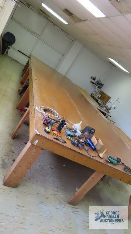 24 ft by 8 ft work table. Bring tools for removal