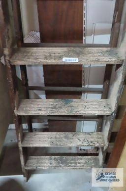 wooden 10 ft step ladder in garage