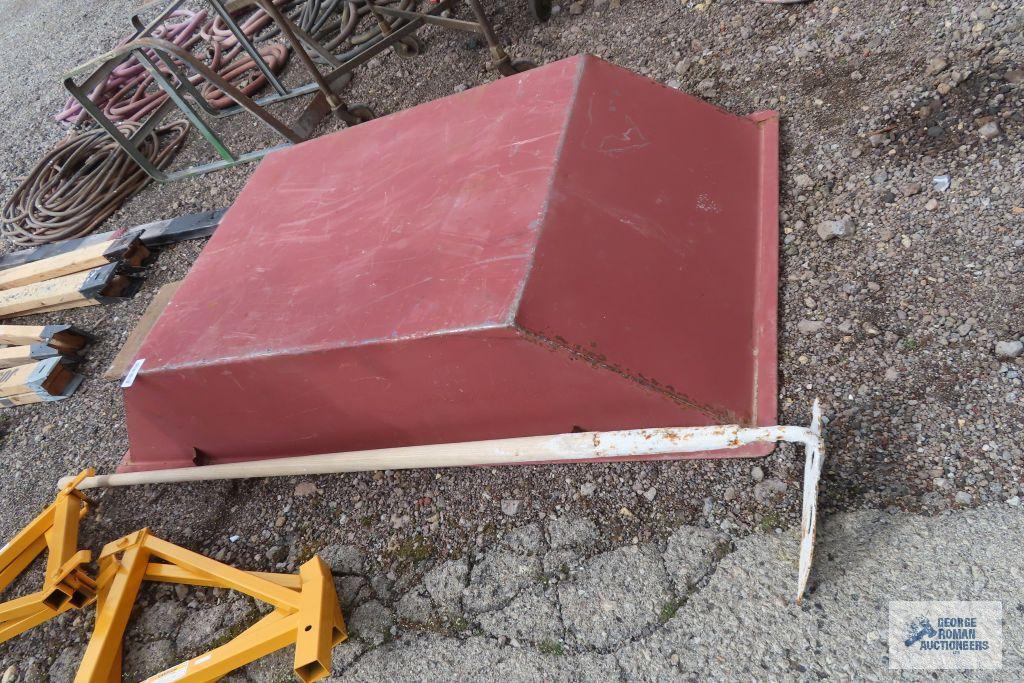 Metal concrete trough with concrete hoe