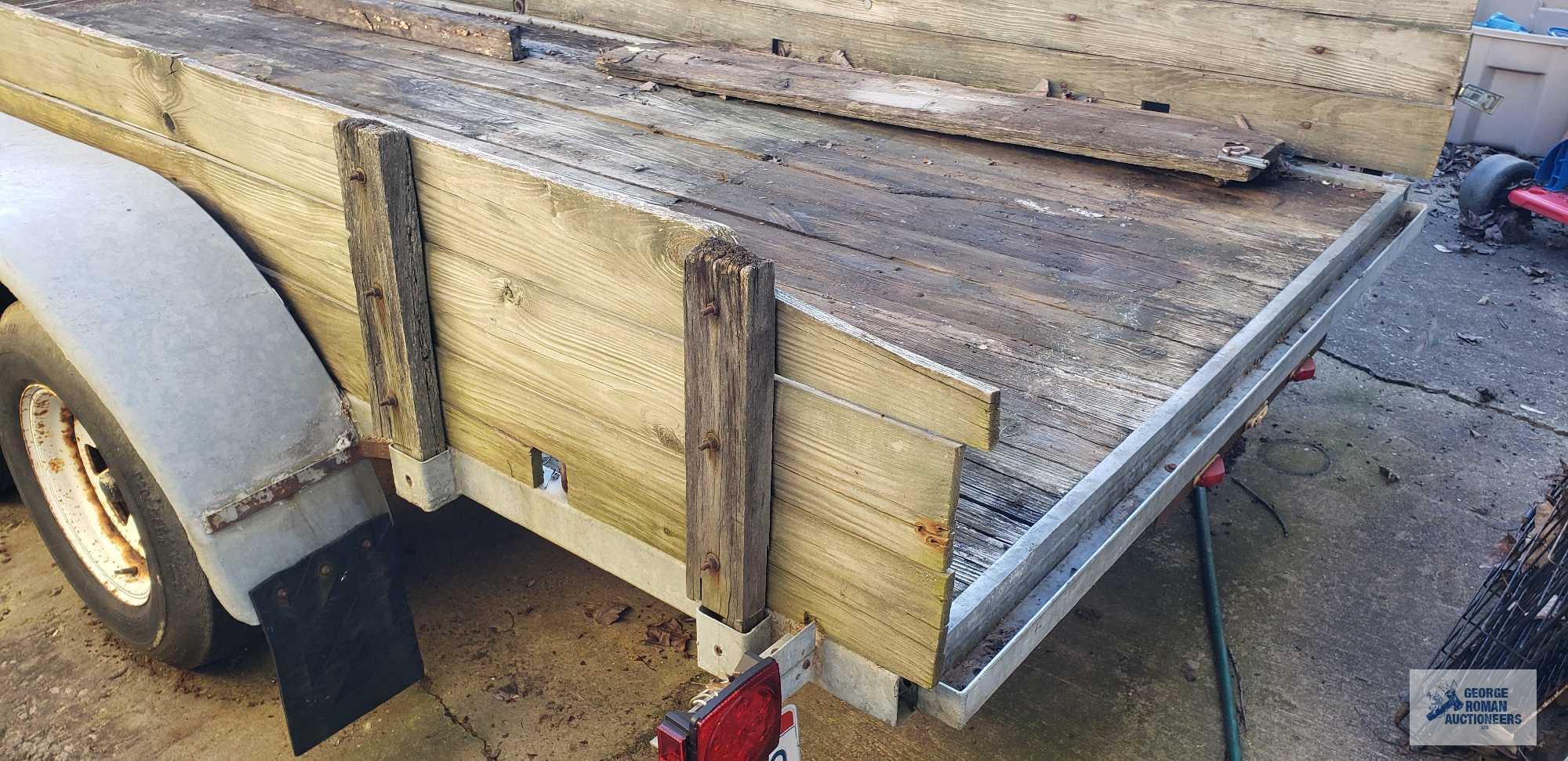 Galvanized shopmade utility trailer with dual 3500 lb axles, measures 14 ft by 5 ft 11 in. It takes