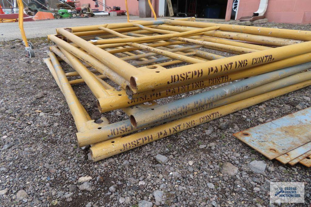 Lot of yellow scaffolding pieces