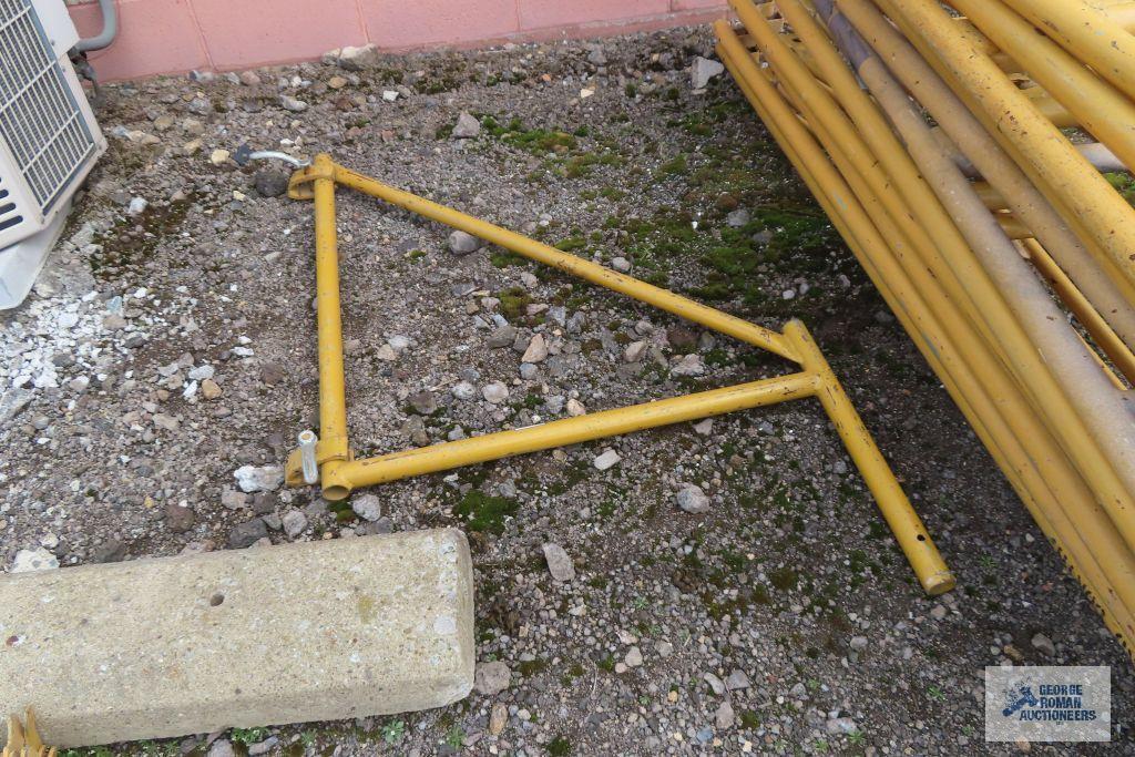Lot of yellow scaffolding pieces