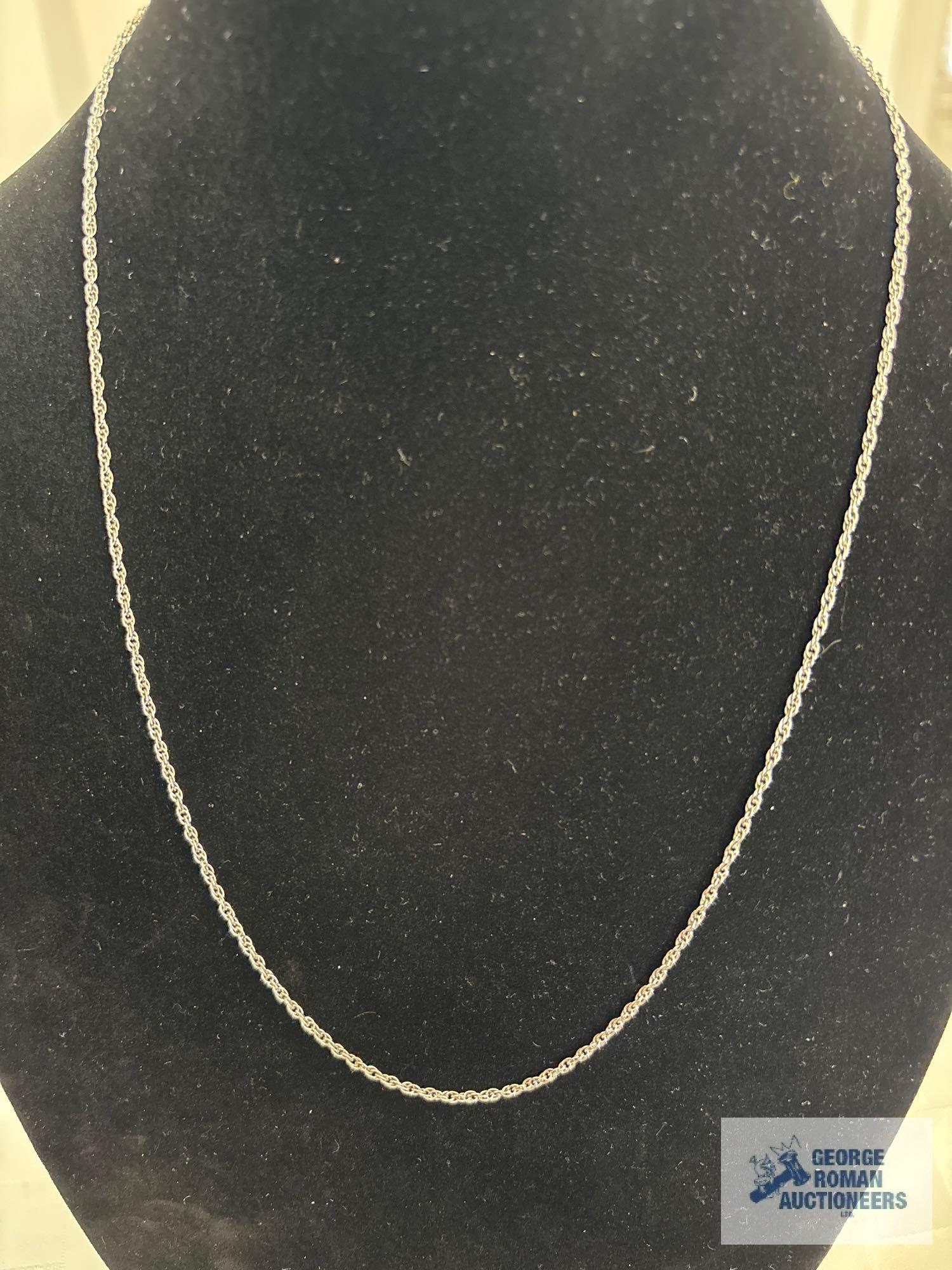 Silver colored rope chain, marked STG, approximate total weight is 4.47 G