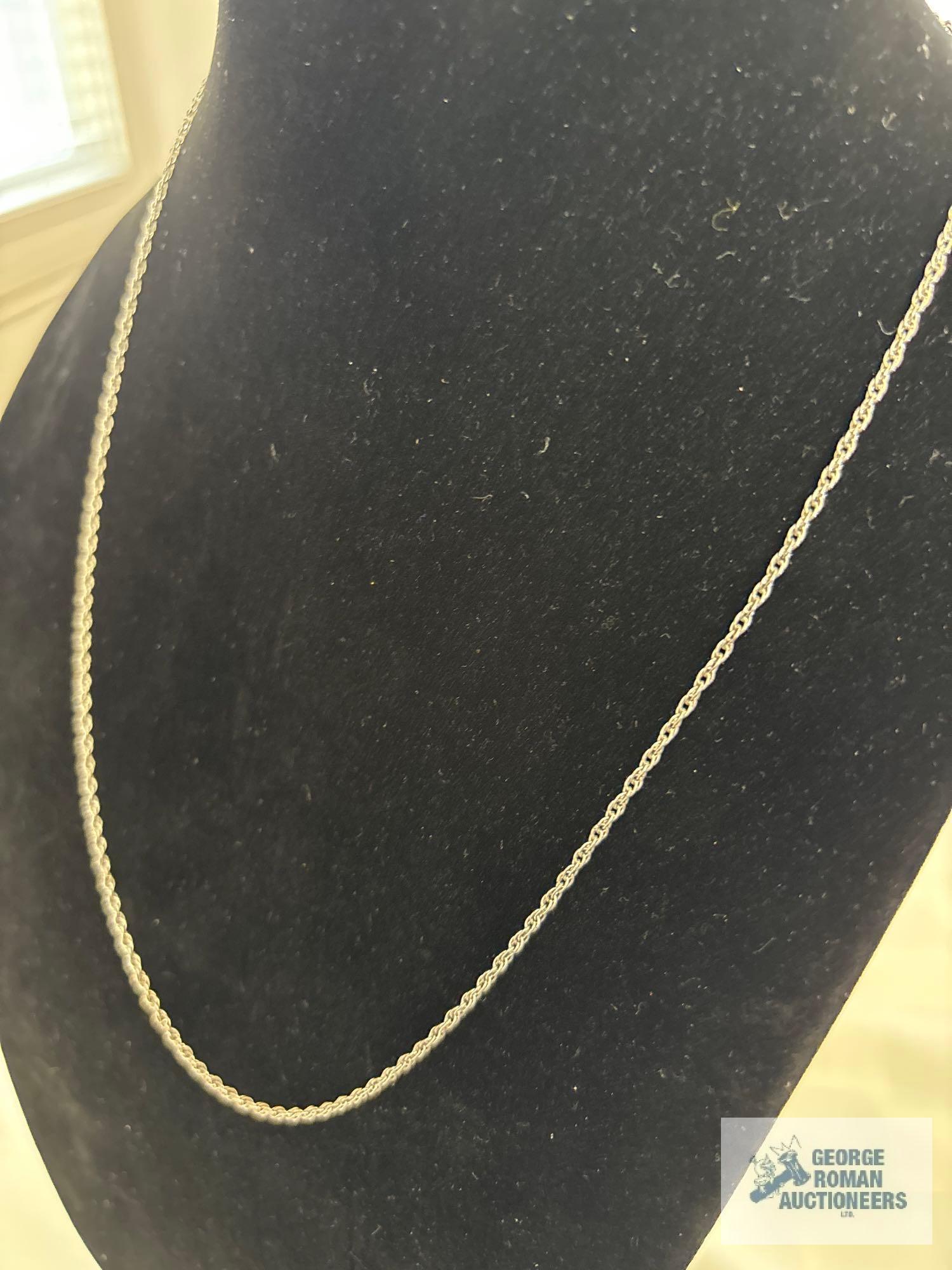 Silver colored rope chain, marked STG, approximate total weight is 4.47 G