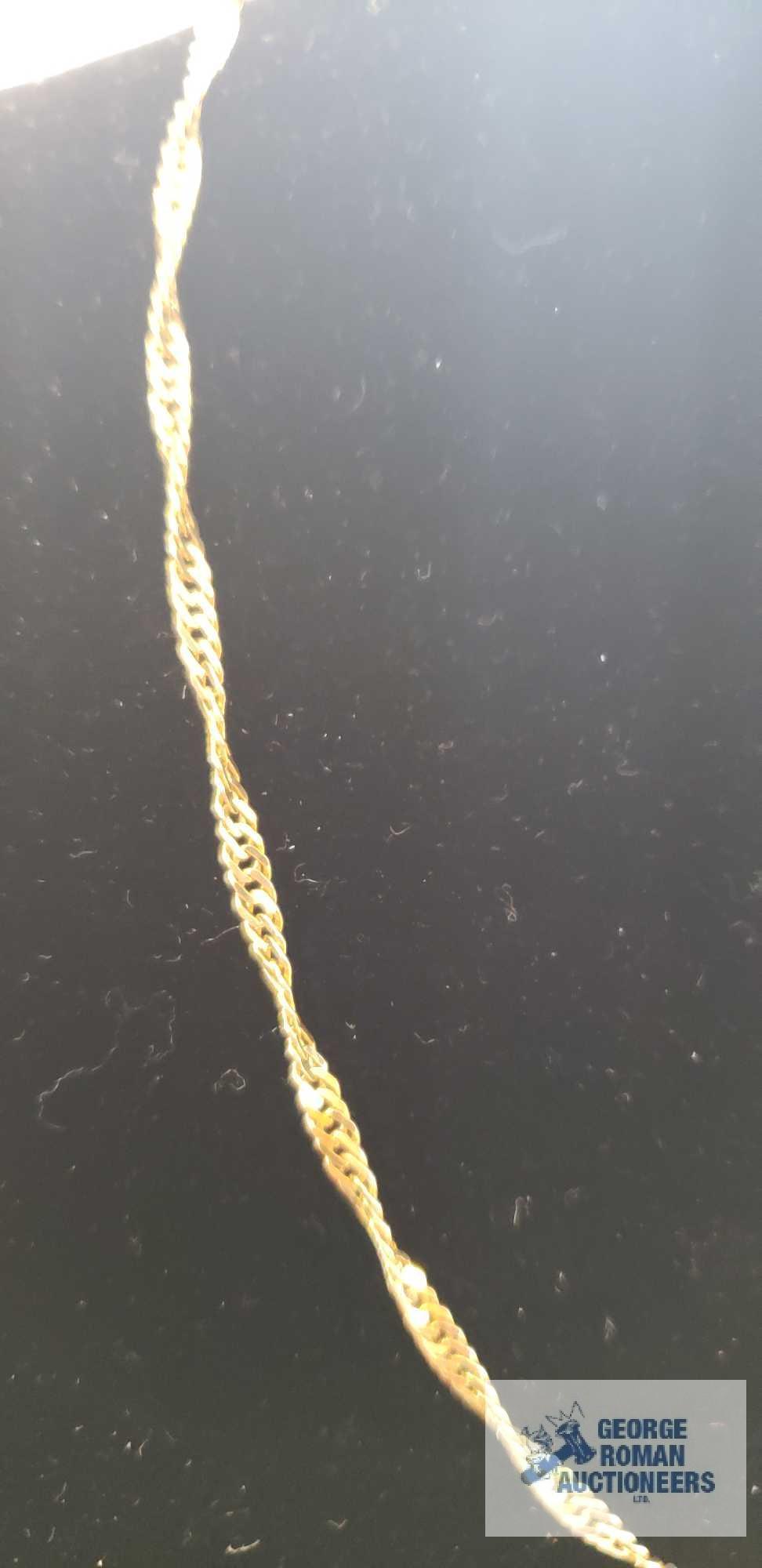 Gold colored twist chain, marked 14KT Italy, approximate total weight is 4.74 G