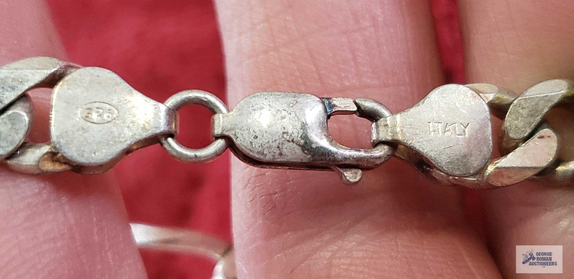 Large silver colored link bracelet, marked 925 Italy, approximate total weight is 52.53 G
