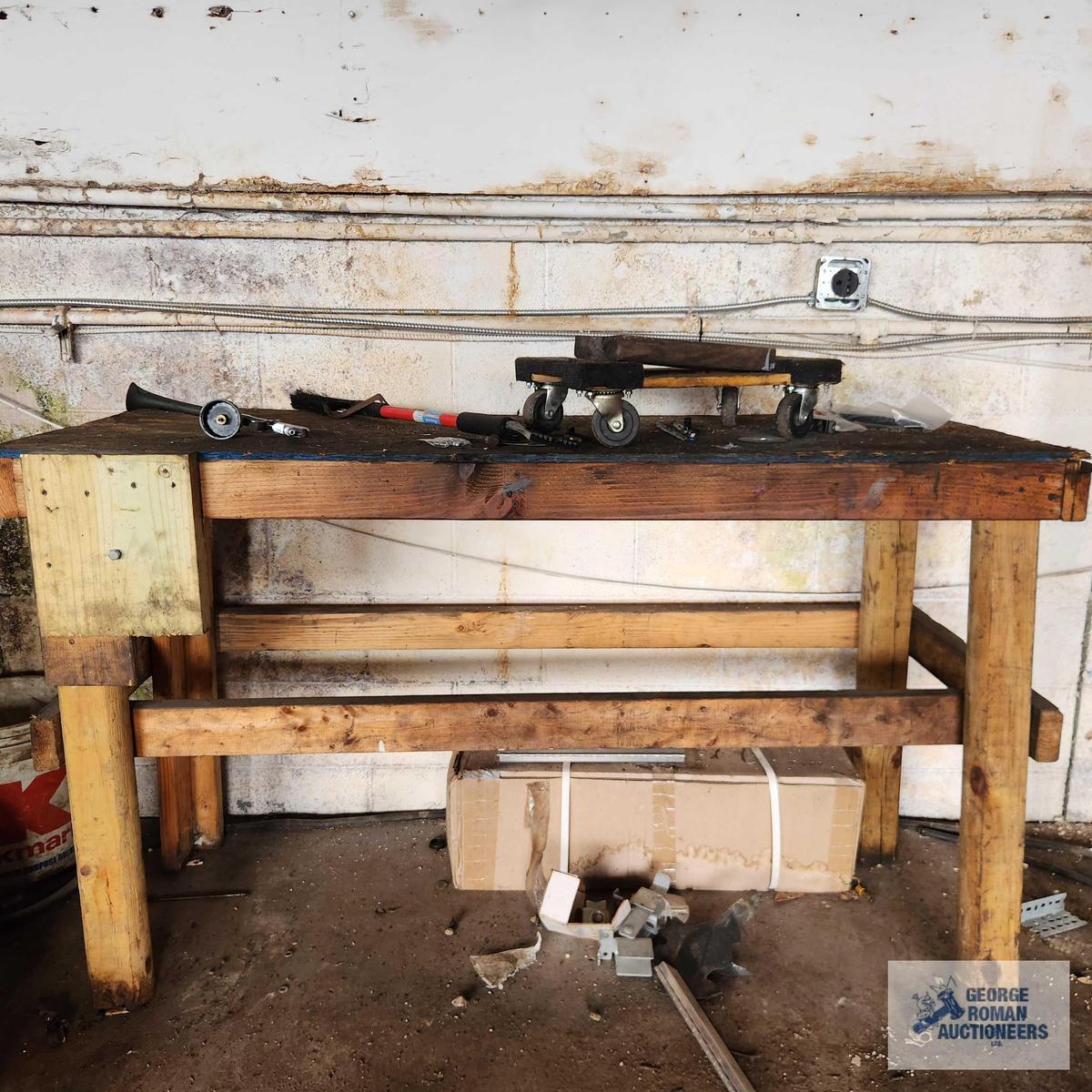 5 foot work bench with four wheel floor dolly, ice scraper and etc