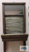 Decorative washboard wall hanging with mirror insert