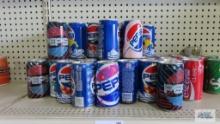 Variety of pop cans including Pepsi. Coke, Sprite
