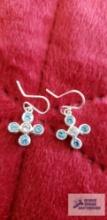Silver colored dangle earrings with clear and blue gemstones marked 925 3.1 G (Description provided