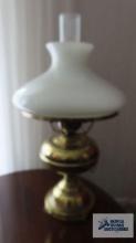 Brass oil lamp style electric lamp with glass shade