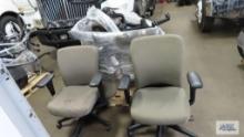 Seven office chairs with arms