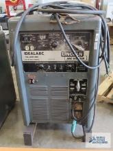 Lincoln...Idealarc, model number TIG-300/300,...three phase,... AC/DC arc welder with cables and sta