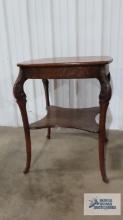 Antique oak carved stand. 30 in. tall by 24 in. square.