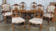 Batesville Cabinet Company antique dining room table with glass top and six chairs. Model 530 Prima