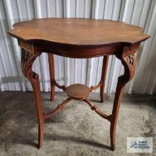 Antique oak carved table. Has separation in center and stains on top. 29-1/2 in. tall by 29 in. wide
