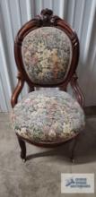Antique cherry rose back style chair with needlepoint seat and back