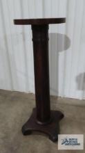 Antique mahogany pedestal 36 in. tall by 13-1/2 in. round