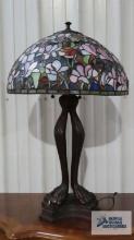 Tiffany style reproduction lamp. 31 in. tall. Lamp shade is 19 in. at base.