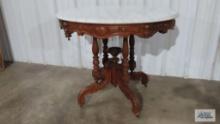 Victorian marble top stand. 28-1/2 in. tall by 35-1/2 in. long by 25 in. wide