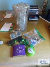 Miscellaneous items, including vase with glass balls, keychains, sunglasses and Lonza rocks