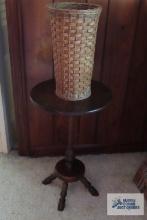 Wooden plant stand and woven planter with metal insert