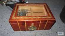 Wooden humidor with cigar cutters