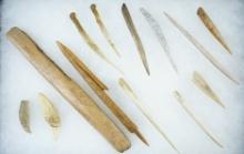 Group of 13 assorted Alaskan Bone Artifacts: 6 3/8" harpoon tip & a 7 3/4" knife handle.