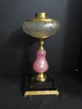 Cranberry Glass Oil Lamp on Black Base
