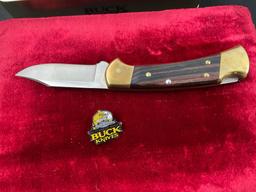 Two Tin Sets of Buck Knives, Models 112 100th Anniversary & Battling Bucks 727 Commemorative series