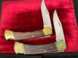 Pair of Vintage Buck 110 Folding Pocket Hunting Knives, Brass and Wooden handles