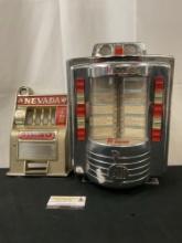 Vintage AMI W-120 Wall Mounted Jukebox, 80 Song capacity & Slot Machine Reno Metal Front Cover