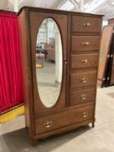 Vintage Wooden Armoire w/ Mirrored Door, 7 Drawers, 1 Cupboard w/ Shelf & Clothes Hanger. See pics.