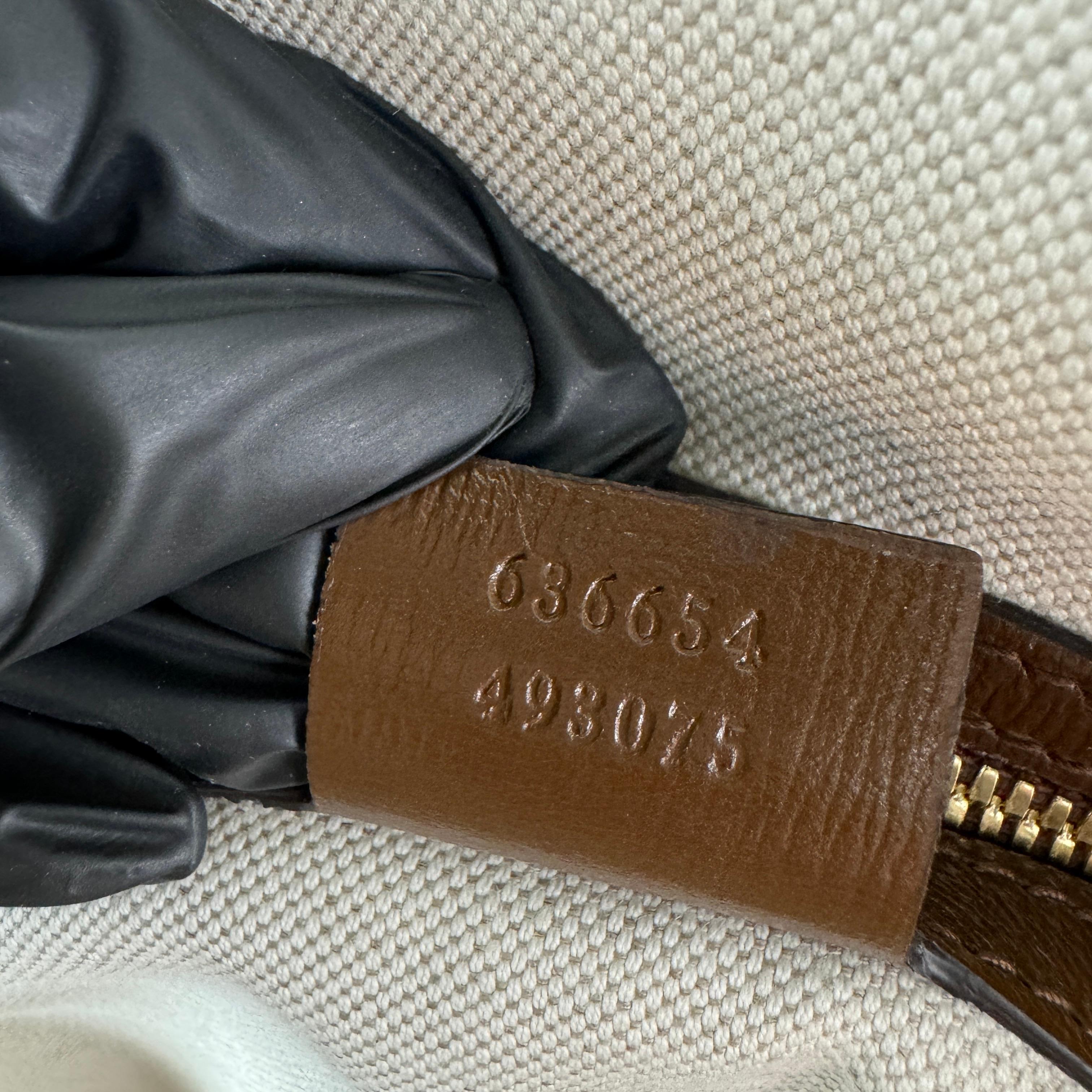 Authentic estate Gucci Fake Not GG Supreme canvas & leather backpack bag; zipper closure