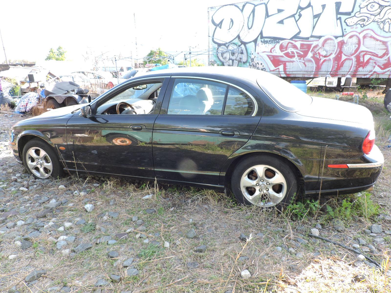 2002 Jaguar S-Type Sedan / Black with Gray Leather