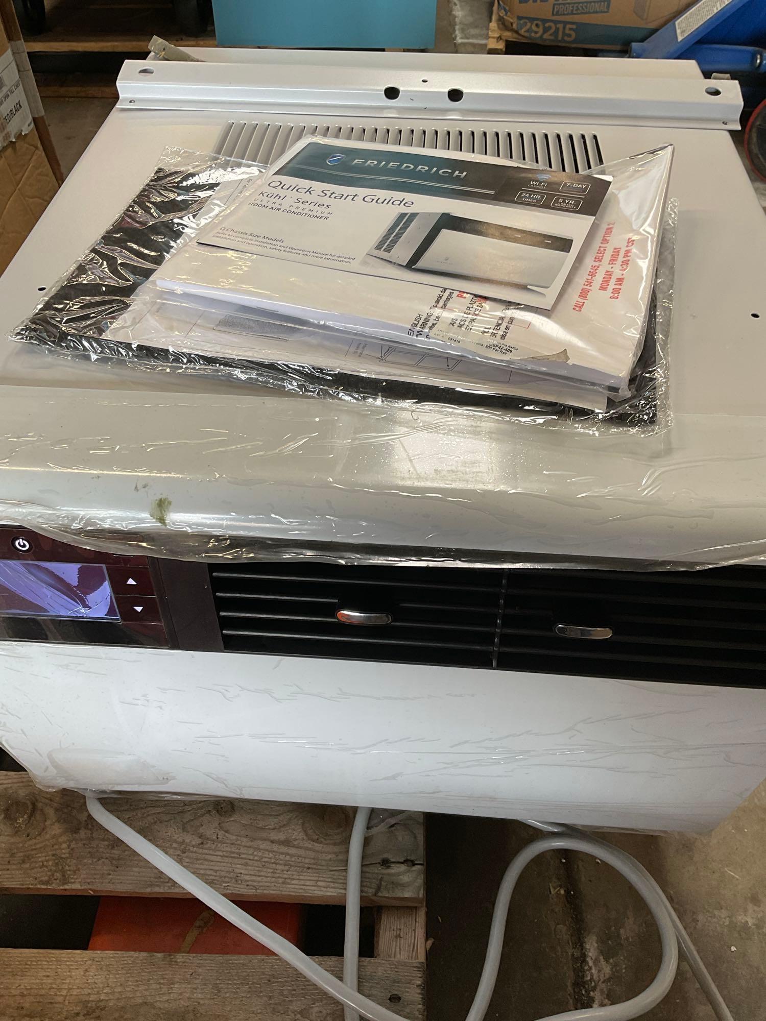 Friedrich Ultra Premium A/C unit, Turned on, Blows cold, panel is cracked
