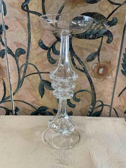 New. 13 1/2", glass candle holders individually packed. 9 pieces