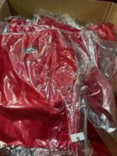 New, individually packed, red, jerseys. 6 medium, 35 small