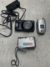 Cameras, cell phone, card reader. 4 pieces