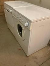 Frigidaire washer and dryer. Turned on, untested