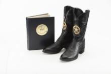 A pair of as new Justin Western Dress Boots size 10 1/2 EE, tops have gold embroidered circle / star